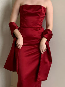 Red satin strapless gown