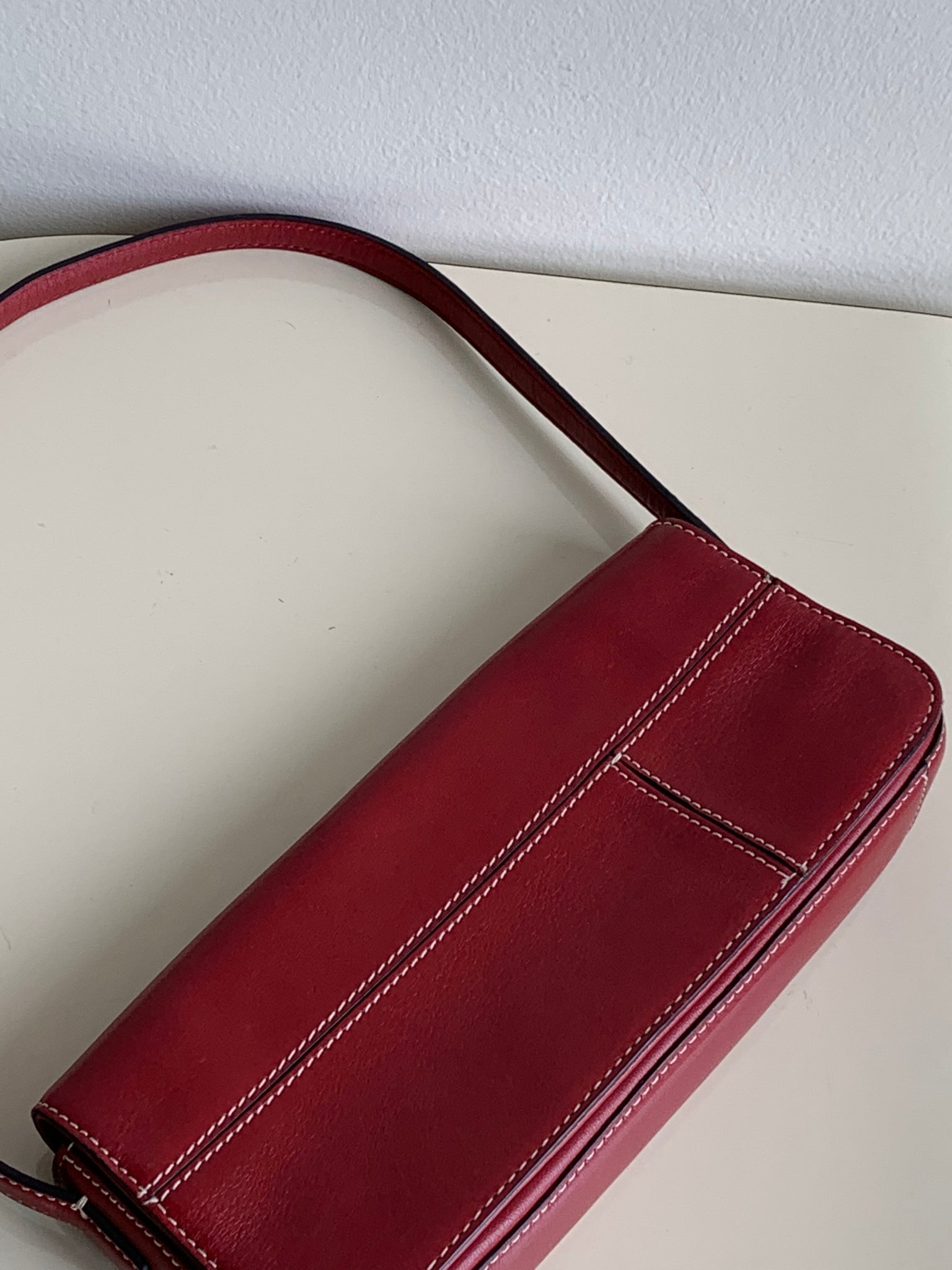 red baguette shoulder bag