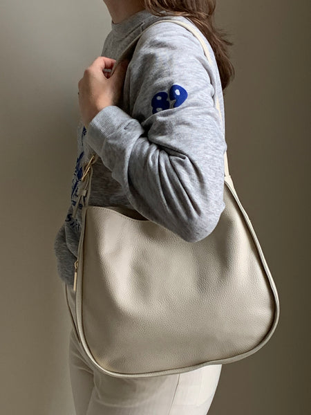 Tote le Monde cream shoulder bag