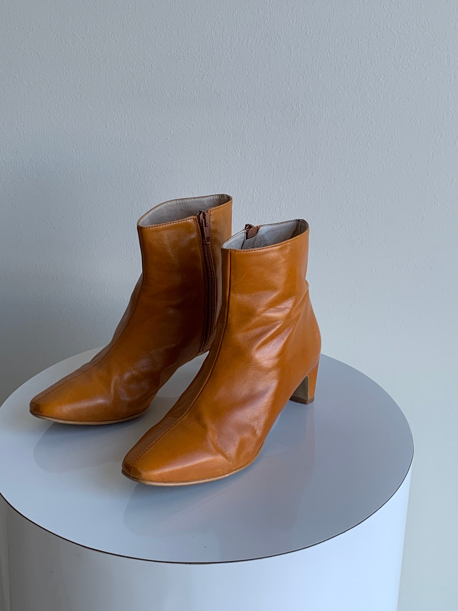 Intentionally Blank orange boots