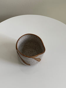 speckled ceramic saucer