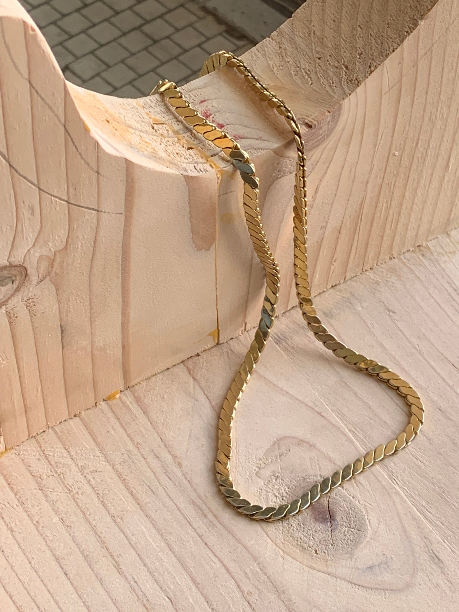 Gold flat snake chain necklace