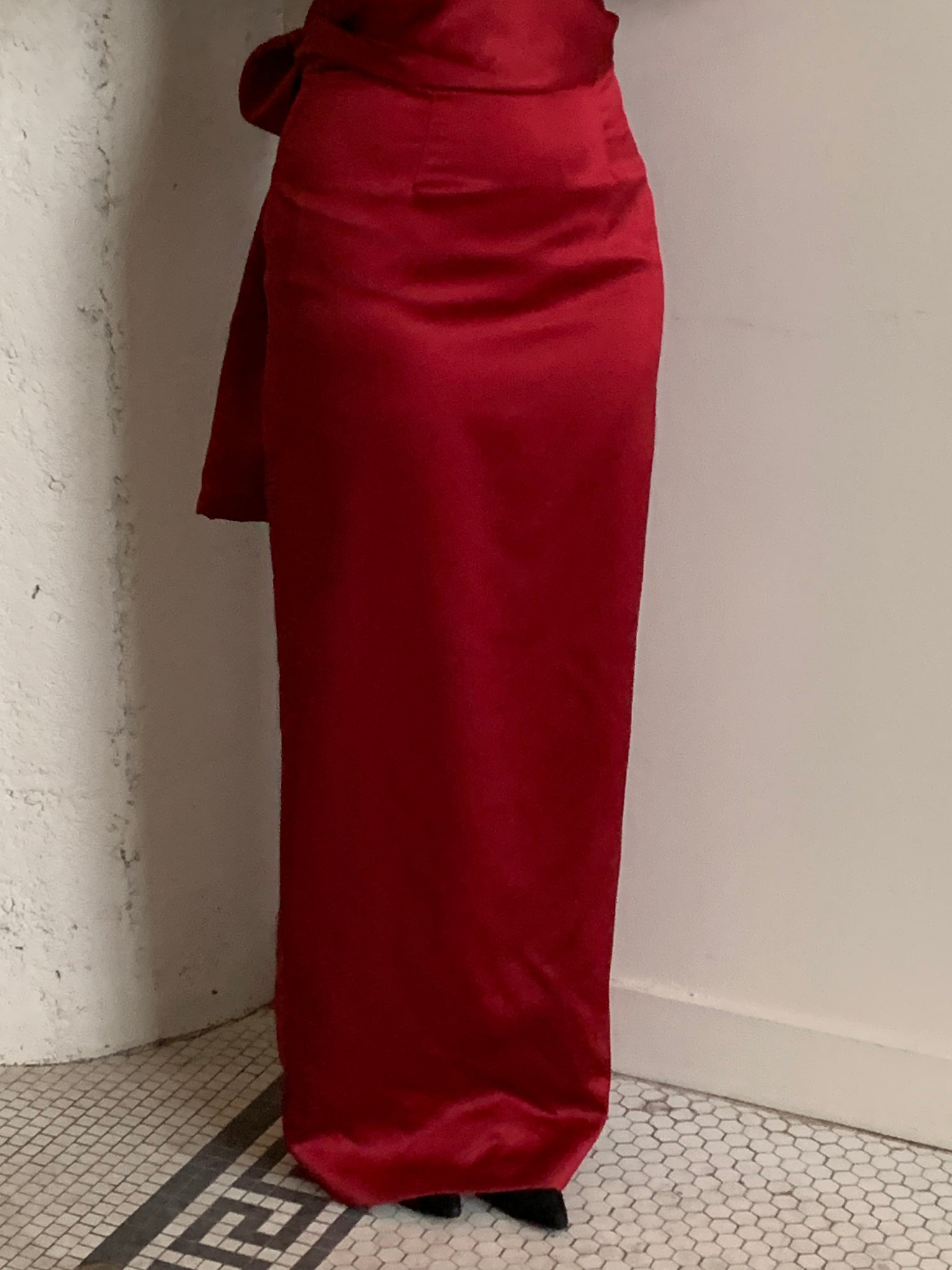 Red satin strapless gown