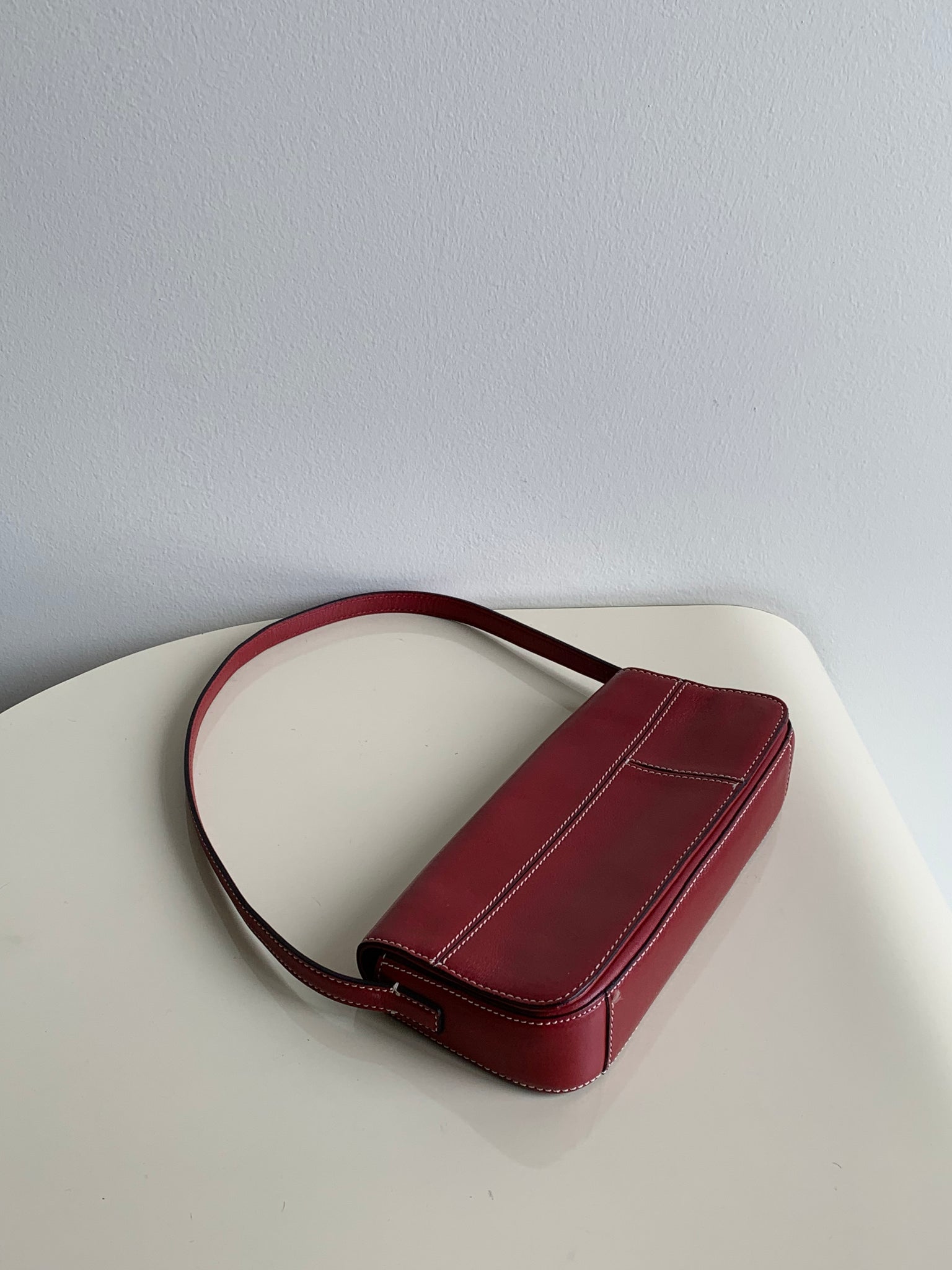 red baguette shoulder bag