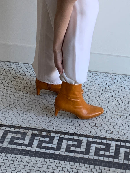 Intentionally Blank orange boots