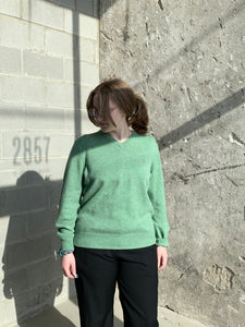 green wool sweater