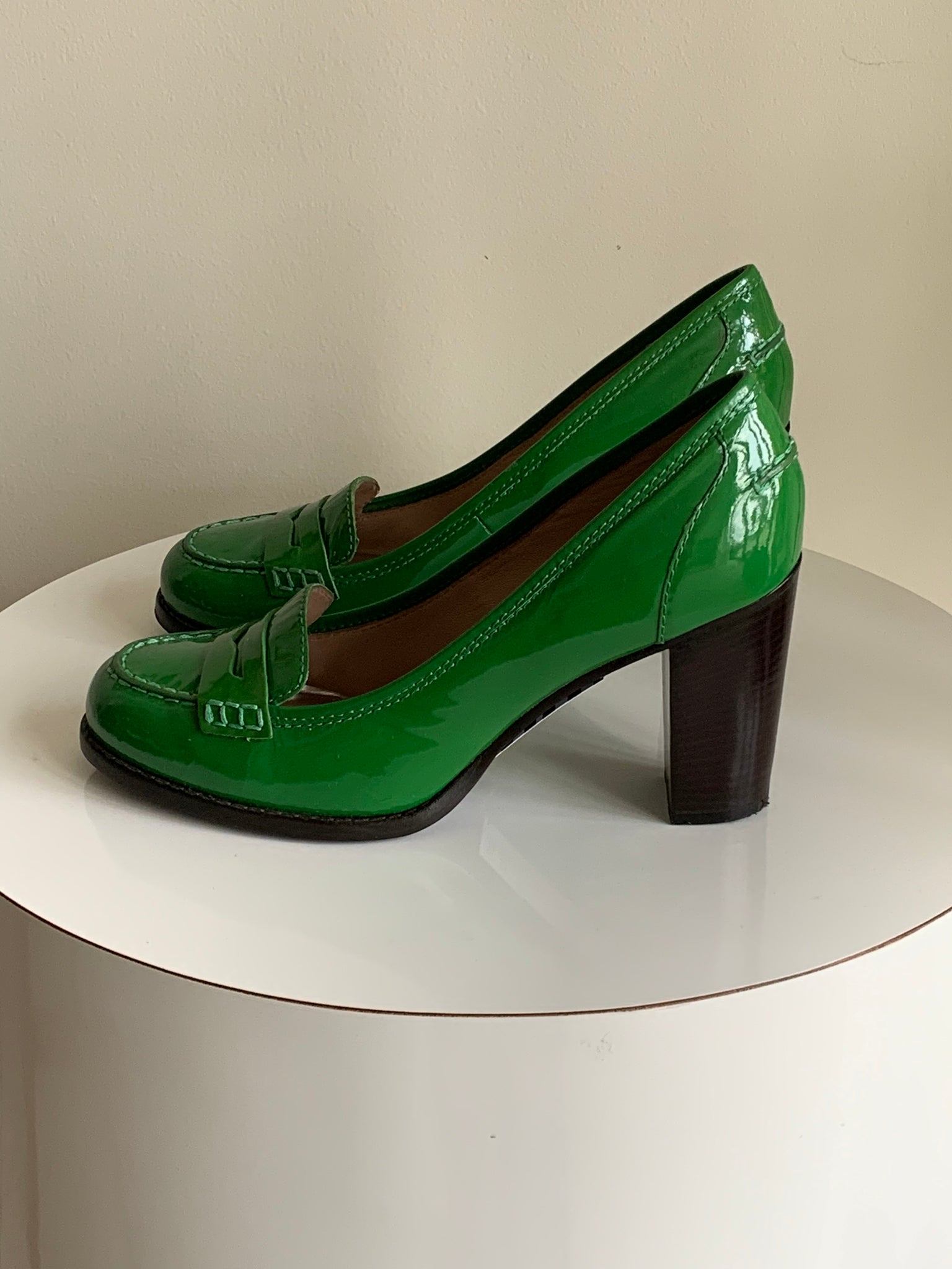 green heeled loafers